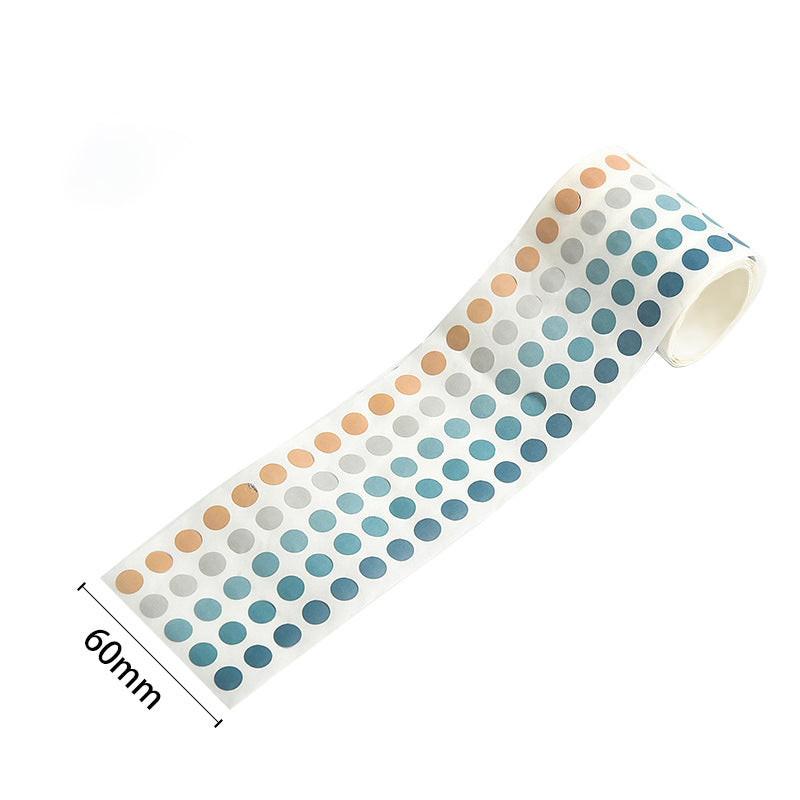 A roll of cool-tone color-coding dot stickers in blue, gray, and soft neutral shades, shown with a 60mm width reference.