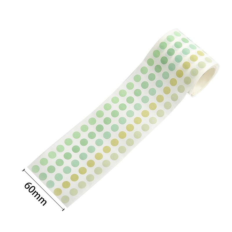 A roll of green color-coding dot stickers in soft, muted tones, shown with a 60mm width reference.