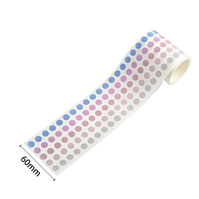 A roll of pastel color-coding dot stickers in soft blue, lavender, pink, and gray tones, shown with a 60mm width reference.